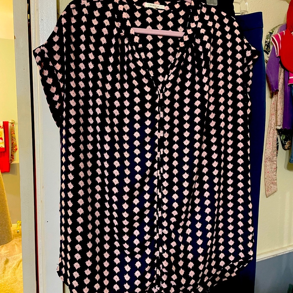 Beautiful blue shirt with pink design